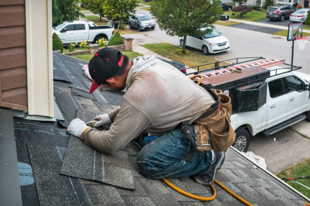 Professional Roofing technician working in Arcadia, WI
